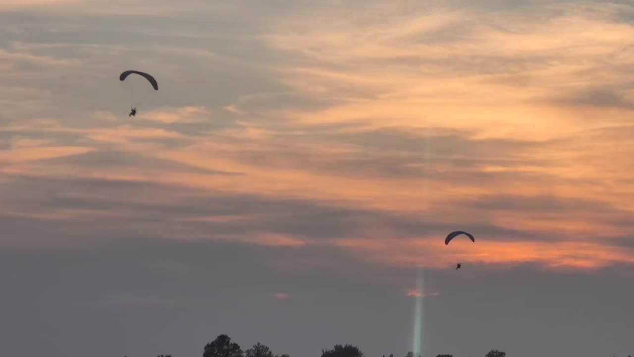 A pair of Paragliders visits QRTRV News live on-site.