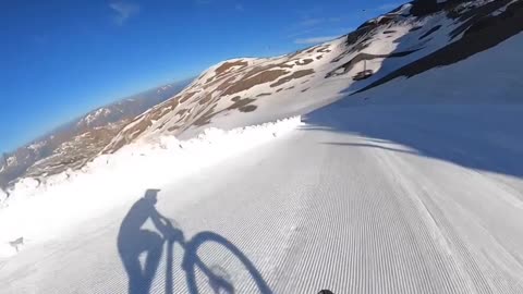 Professional Bicyclists Race Down Alps