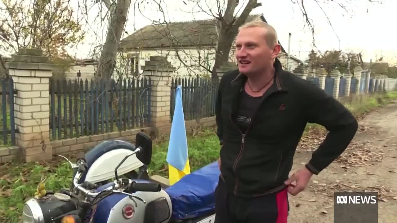 Ukrainians cheer for the recapture of Kherson after an apparent Russian retreat