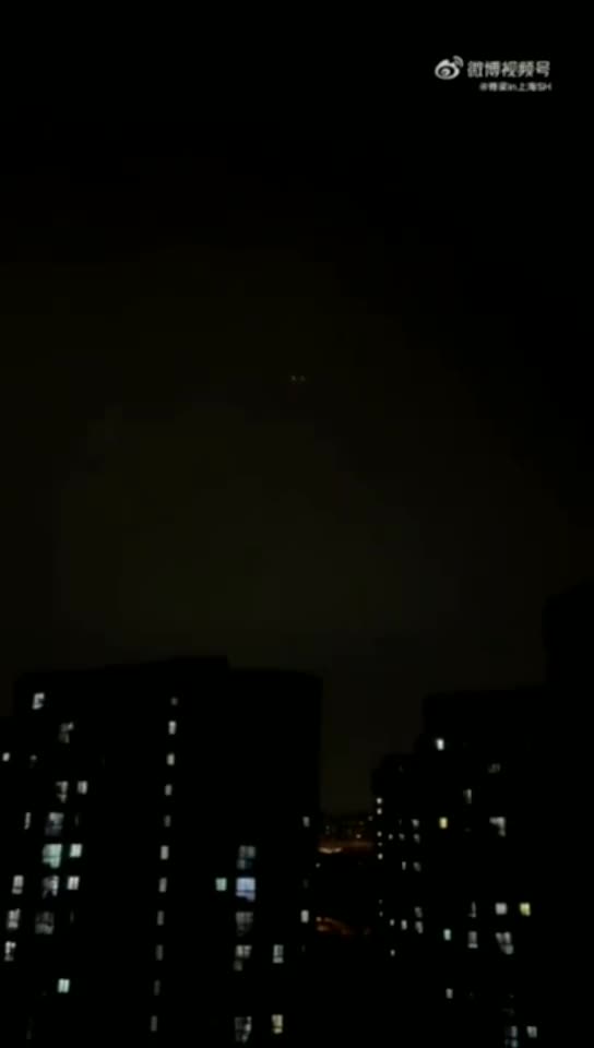 China: Shanghai residents go to their balconies to sing & protest lack of supplies.