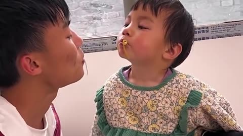 This little girl can eat food all on her own!.hd