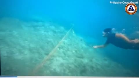 Philippine Coast Guard remove floating barrier installed by Beijing