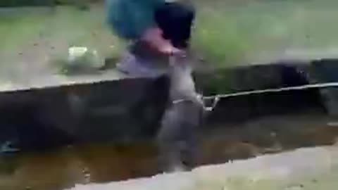 Idiot Tries to pet a Crocodile🐊