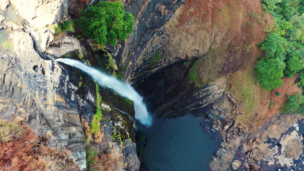 Nature's Symphony: The Cascading Mountain Waterfall