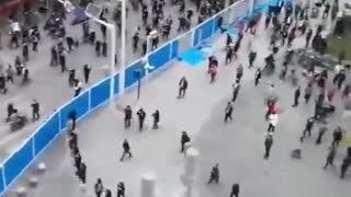 People tear down barricades in #Wuhan. Anti-lockdown protests are spreading in more China cities
