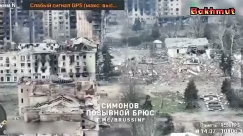 Flags of Russia and PMC Wagner fly over the ruins of Bakhmut's administration