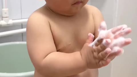 Cute boy's bathing video