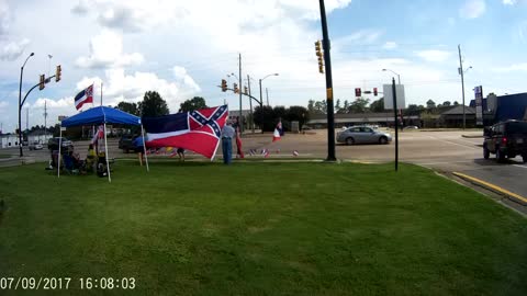 Crazy Woman Tries to Take Our Flags