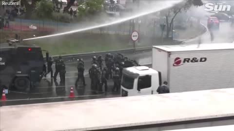 Brazilian police fire water cannons and rubber bullets at anti Lula protesters