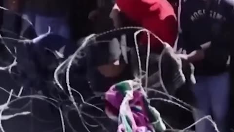Migrant group attempts mass entry into US at Mexico border