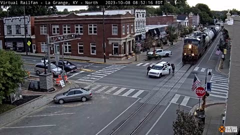 pushing car out of the way of oncoming train in La Grange