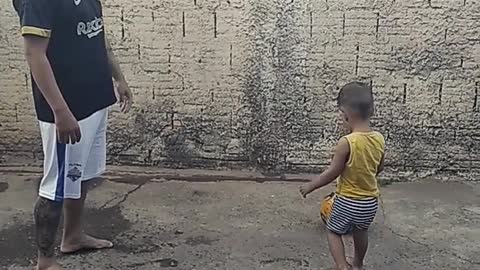 brazil teaching son to play soccer