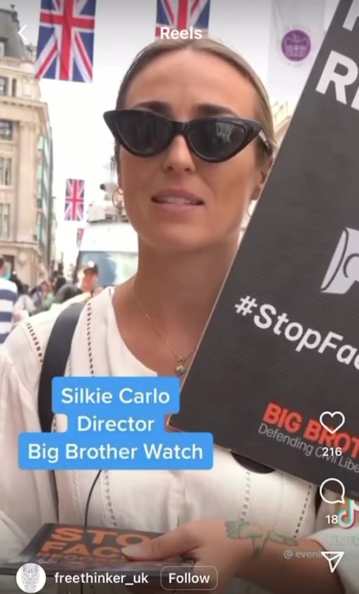 Biometric Data Being Taken Of Shoppers Walking Down The Street.