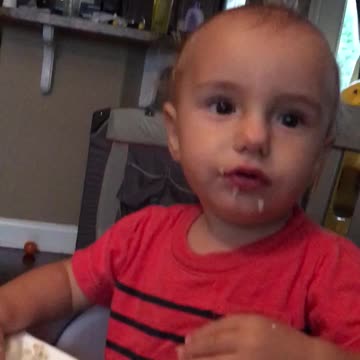 Baby caught eating like a pig