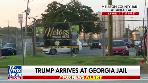 Trump turns himself in at georgia jail