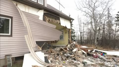 Driver dead after semi-truck crashes into Edmonton home