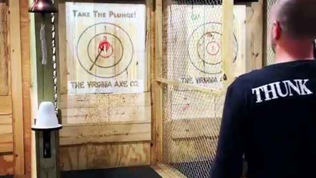 Guy Displays Talent by Accurately Throwing Plunges at Target Board and Sticking Them to it