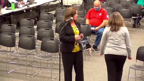 School board member exposed and embarrassed by patriot. Storms off.