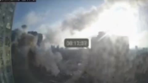 A Ukrainian shell hitting a residential building in Zhuliany near Kiev