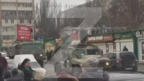 Polite people on the streets of Melitopol inform residents about the place of distribution of