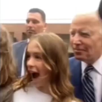 This young lady looks very uncomfortable when Biden tells her to wait till she's 30 why