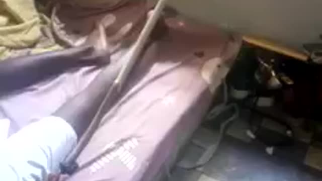 A THIEF STEALING PHONE