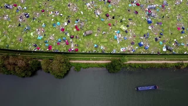 Sea of litter and tents left behind after Reading festival