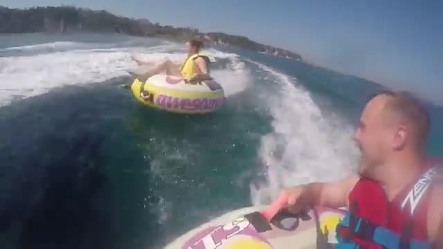 Girl Wipes Out While Tubing