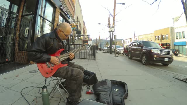 A guy playing Joe Satriani...