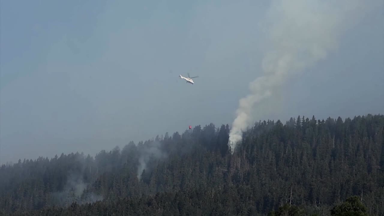 Villagers flee as wildfires burn in Switzerland