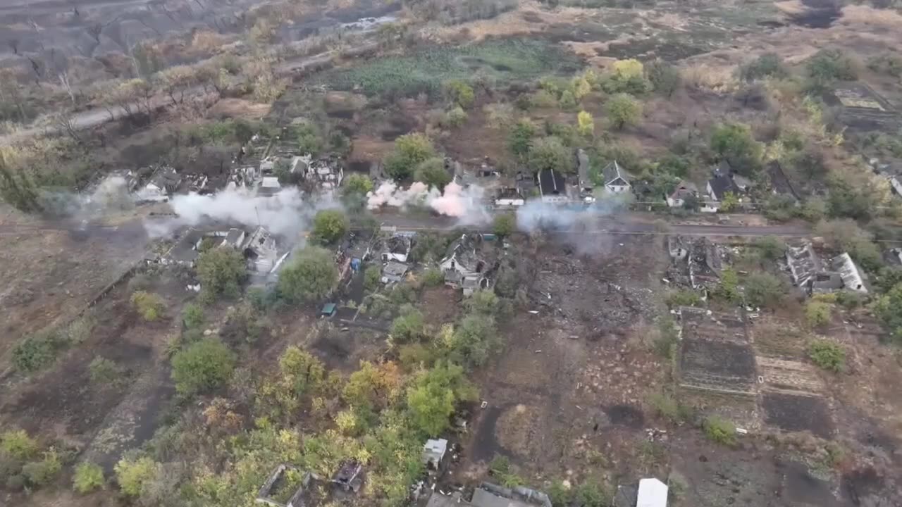 Ukrainian BTR-4 "Bucephal" with a 30 mm gun fires at buildings occupied by