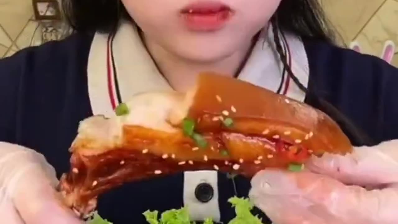 Chinese girl eating meat