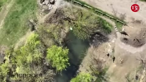 Russians carrying their wounded fellow soldiers to bunker come under another drone attack