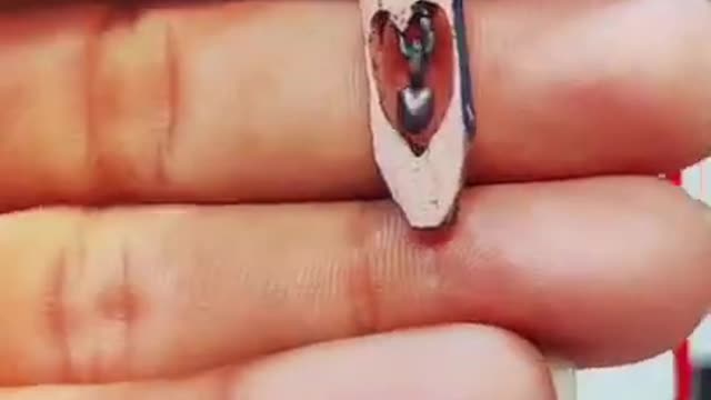 Guy Shows Off Sharp Pencil Carving Skills by Carving Pendant Out of Pencil