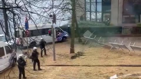 Farmers in Brussels tear down barricades erected by police