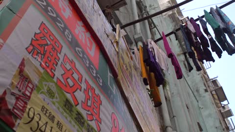 Laundry Hanging Over Hong Kong Street