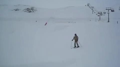 Skier Crashes Into Snow While Landing A Jump