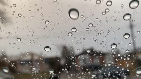 Rain and Thunder on Window