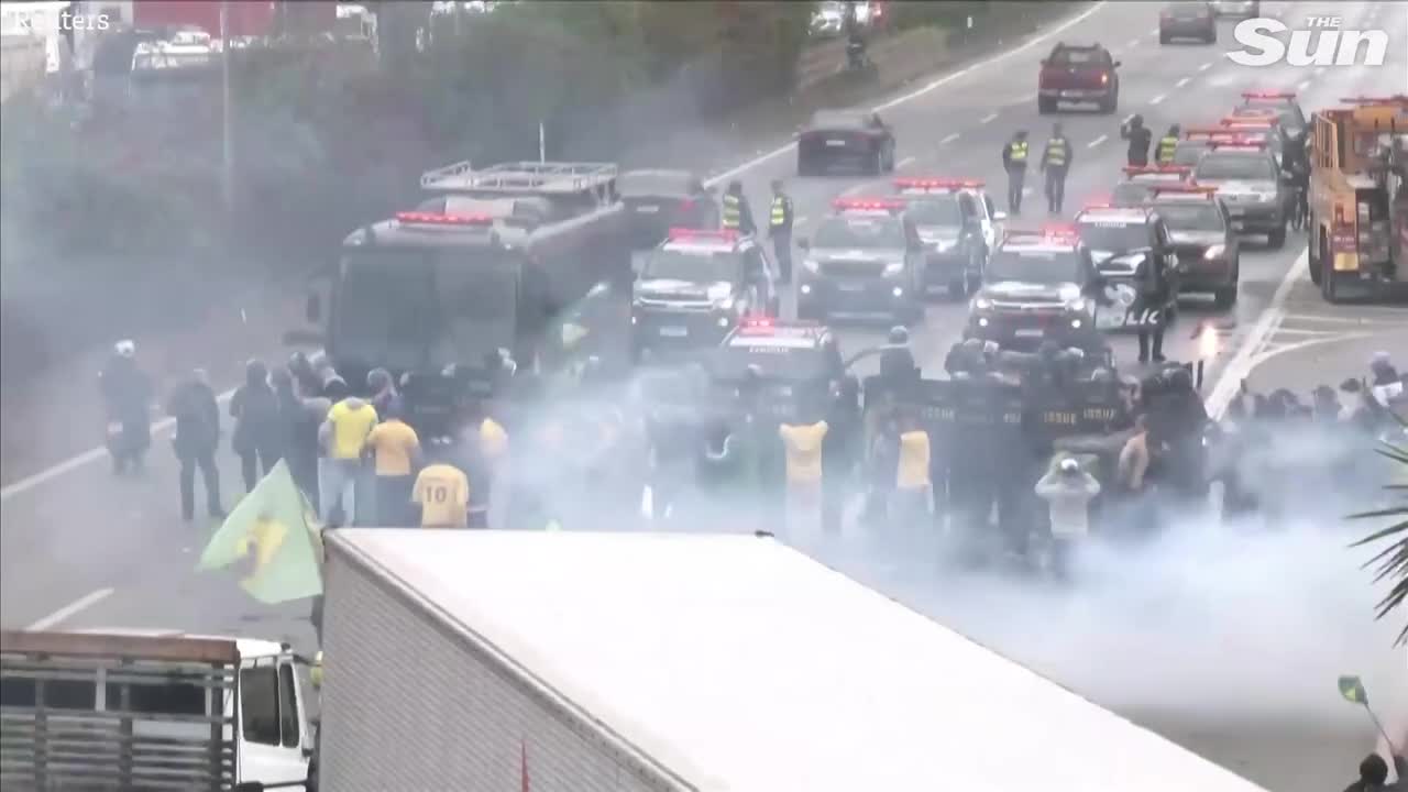 Brazilian police fire water cannons and rubber bullets at anti Lula protesters