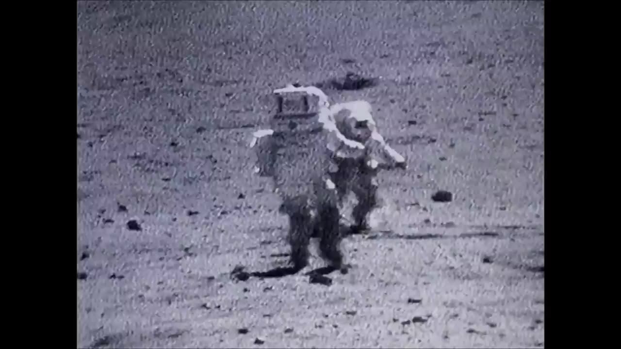 Astronauts Gracefully Descend to the Moon's Surface During NASA's Apollo Mission