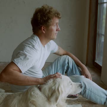 A cute dog and cool boy