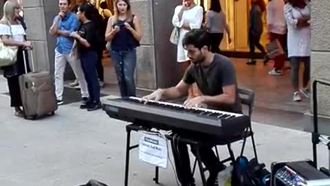 a musician on the street of Milan.