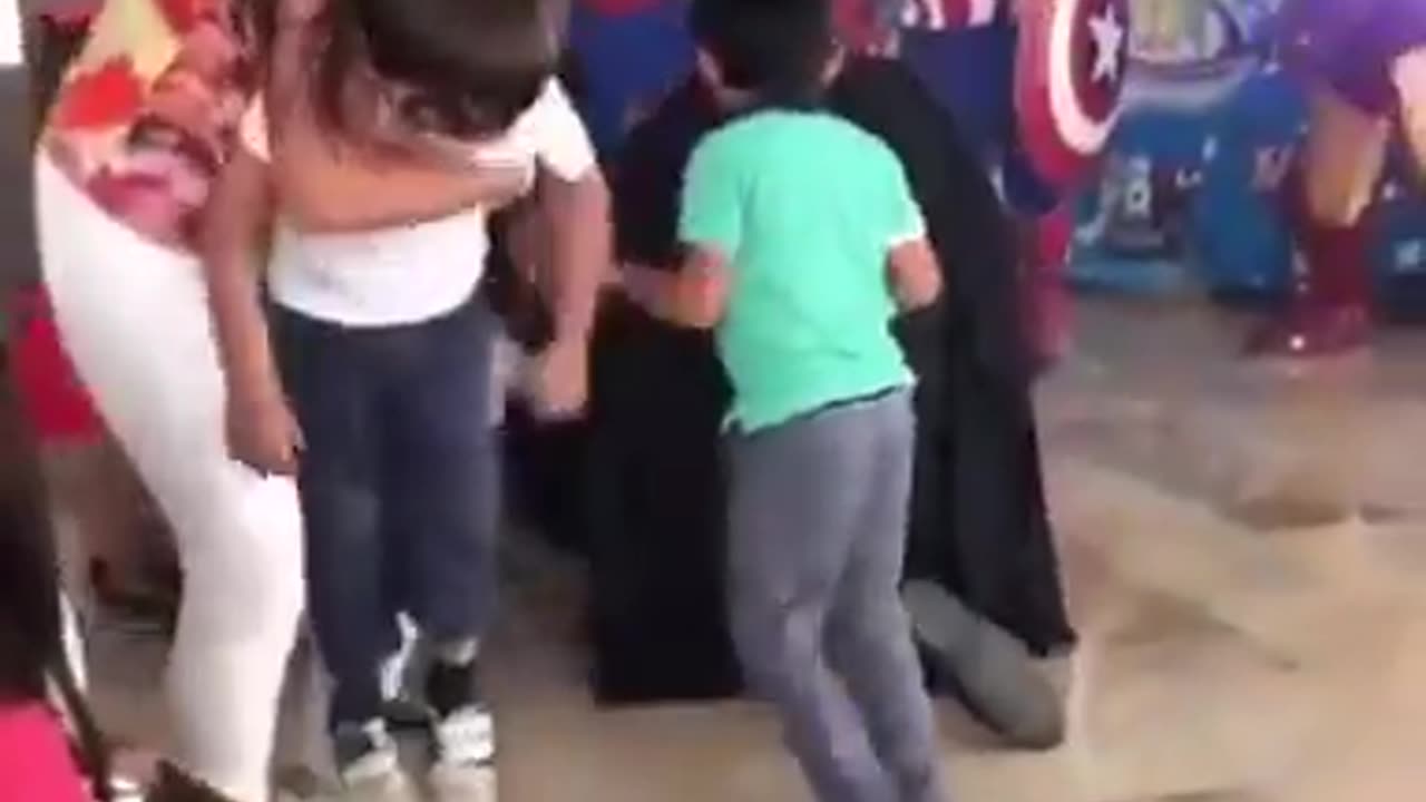 Kid saves batman