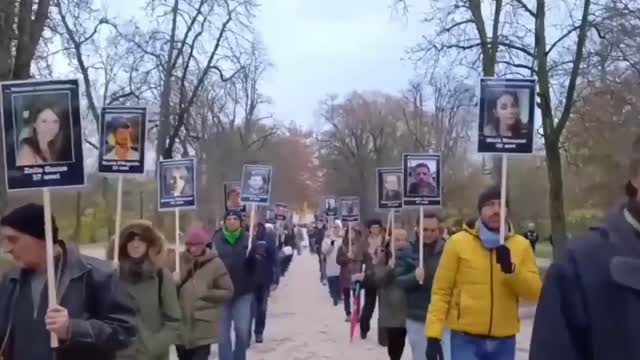 This will only happen more often - people walk out to pay tribute to those who died from the vaccine