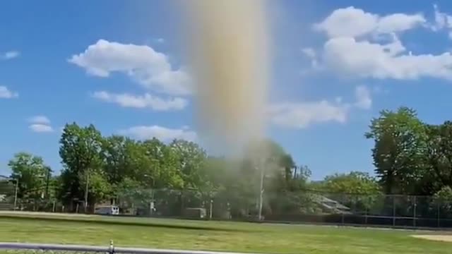 Dust Devil Forms at Playground and Disintegrates as it Flies in the Sky