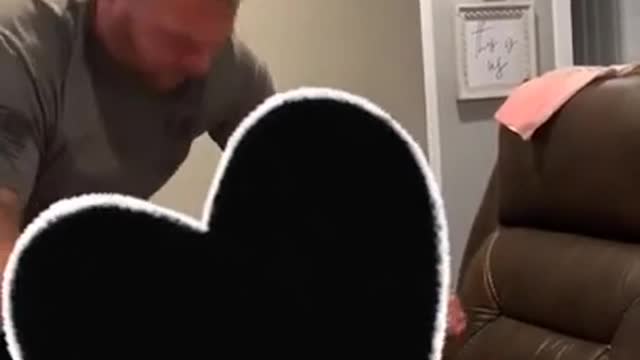 Dad Struggles to Change Baby's Dirty Diaper