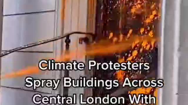 Climate ProtestersSpray Buildings AcrossCentral London WithOrange Paint