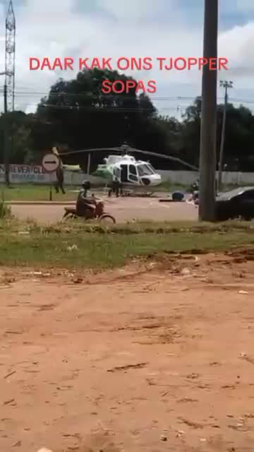 Helicopter crash with truck on the road.