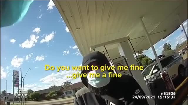 Police punch men accused of not wearing masks