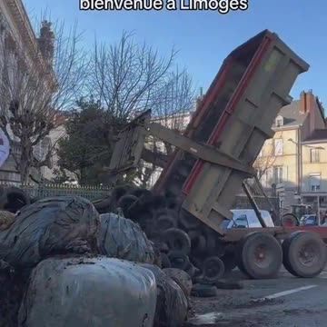 Farmers dump manure and tyres outside council buildings in Limoges France